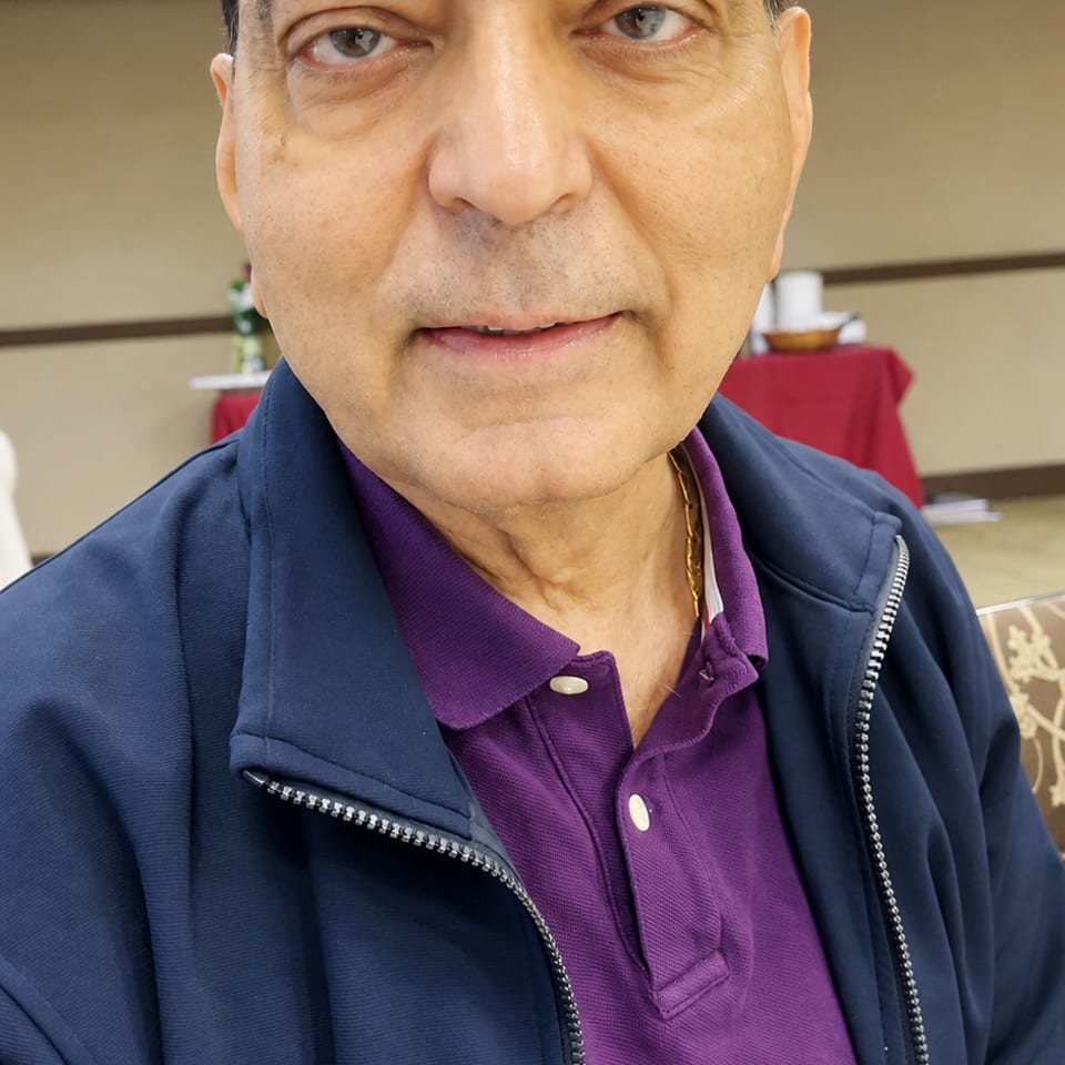Guest in a purple polo at an event