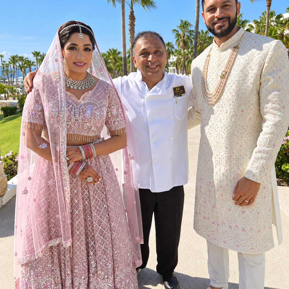 Wedding couple with a chef outdoors